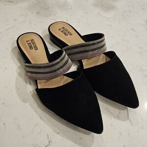 Flat black sandals with metallic strap